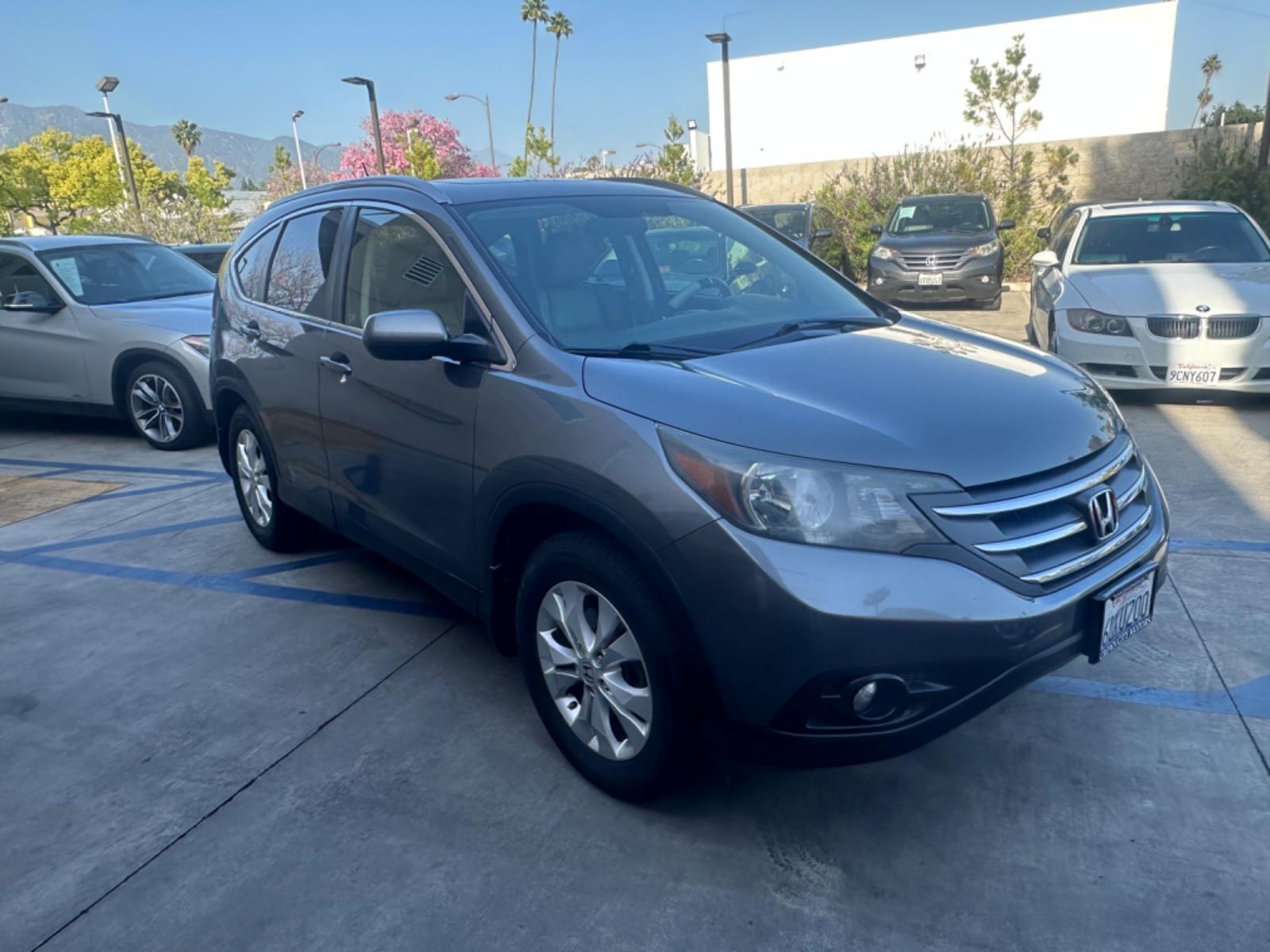 2012 Grey /Gray Honda CR-V EX-L 2WD 5-Speed AT (JHLRM3H78CC) with an 2.4L L4 DOHC 16V engine, 5-Speed Automatic transmission, located at 30 S. Berkeley Avenue, Pasadena, CA, 91107, (626) 248-7567, 34.145447, -118.109398 - Moon-roof! Leather seats! This 2012 Honda CR-V EX-L 2WD 5-Speed AT looks and drives good. - Photo #6